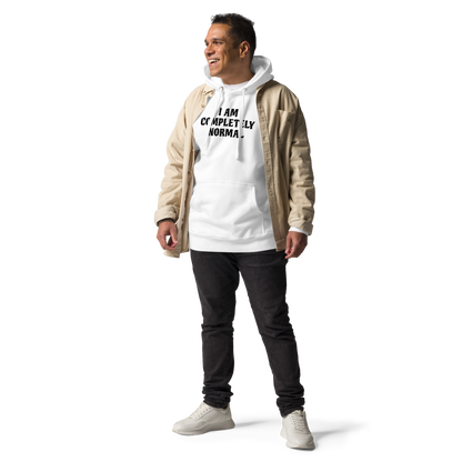 "I am completely normal" printed on a white unisex hoodie worn by a male with a jacket on top