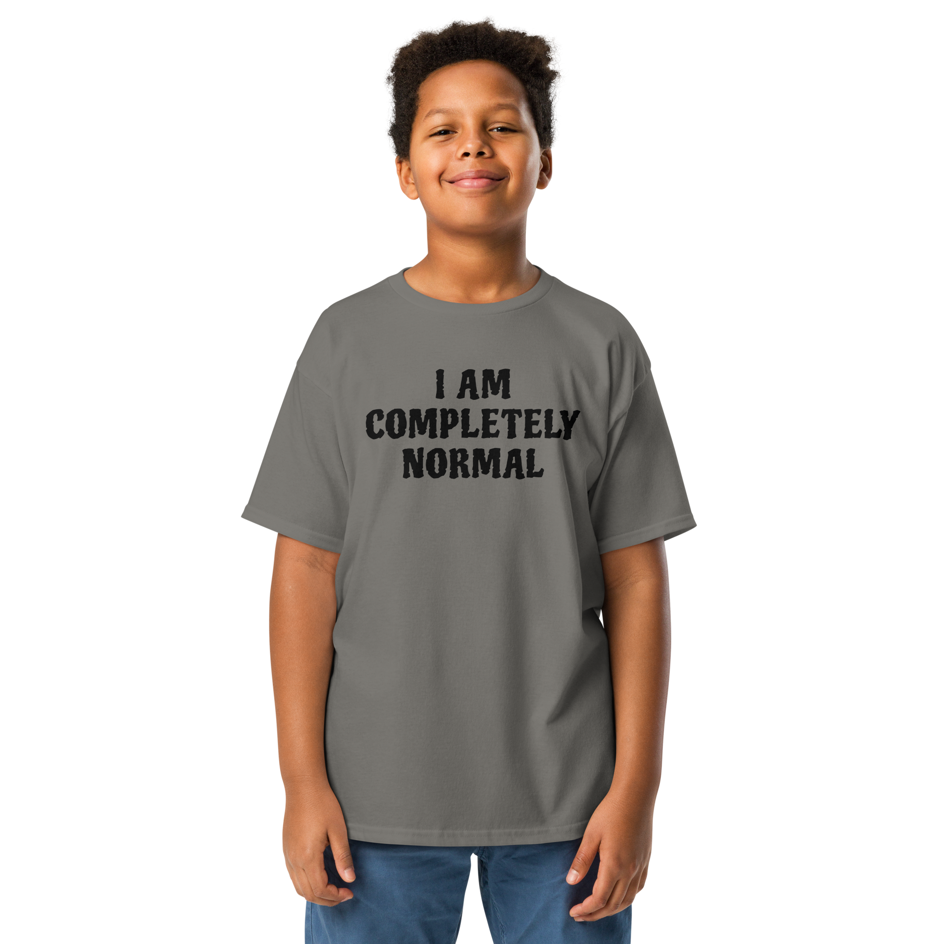 "I am completely normal" printed on a charcoal youth classic tee worn by a male