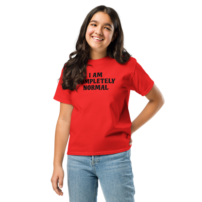 "I am completely normal" printed on a red youth classic tee worn by a female