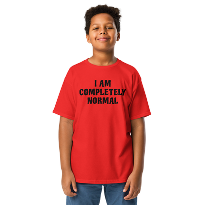 "I am completely normal" printed on a red youth classic tee worn by a male
