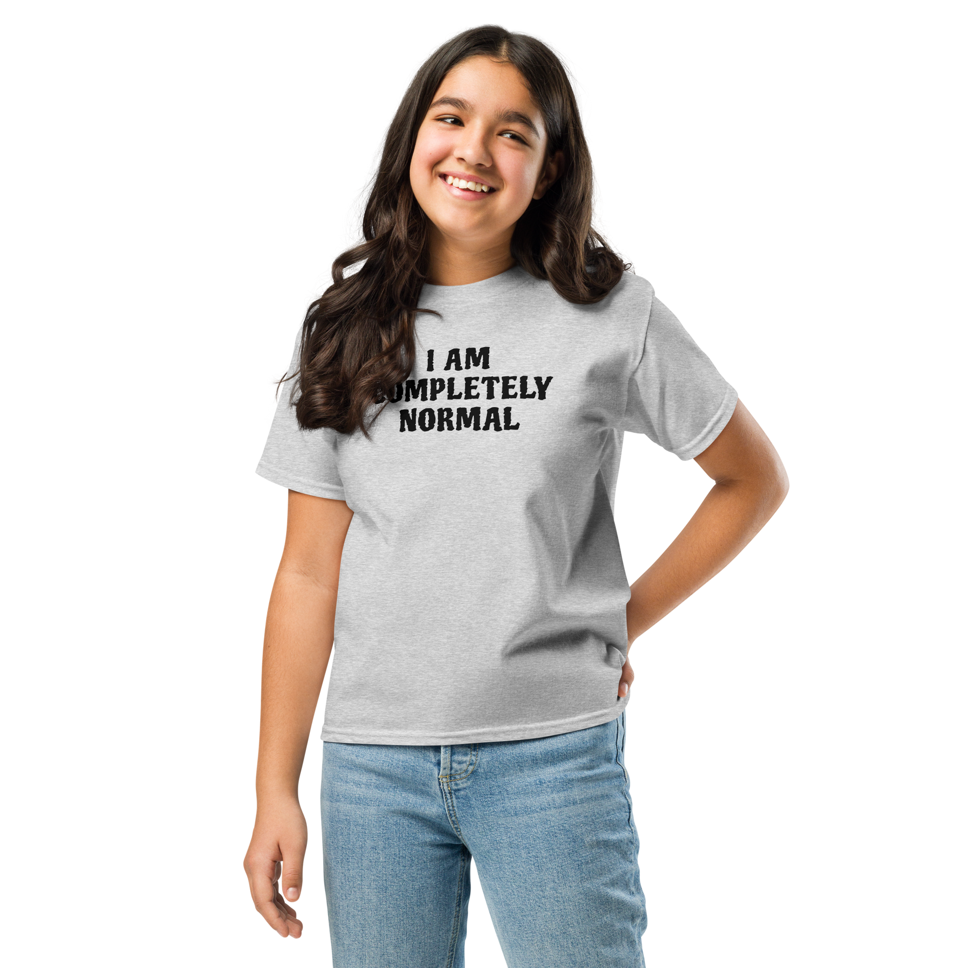 "I am completely normal" printed on a sport grey youth classic tee worn by a female