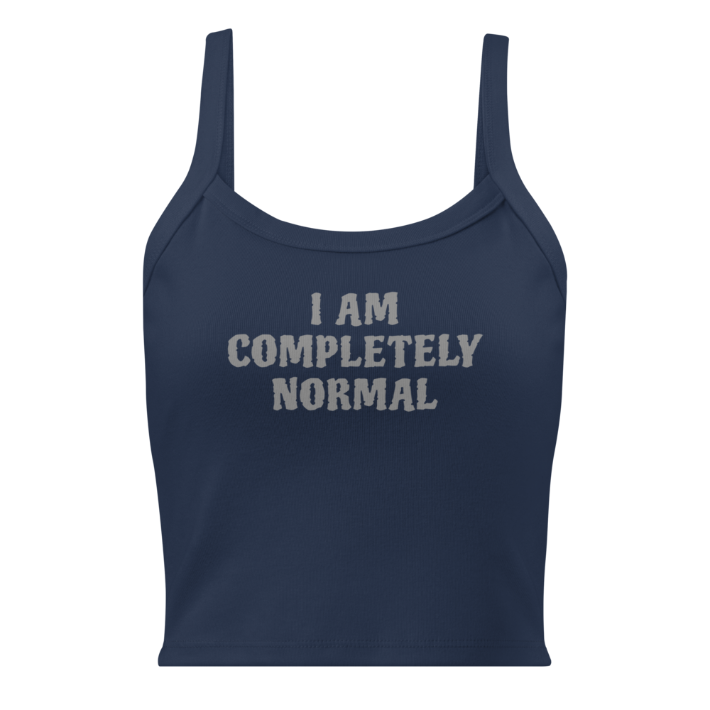 "I am completely normal" printed on a solid navy blend women's micro-rib tanktop laying on a flat surface