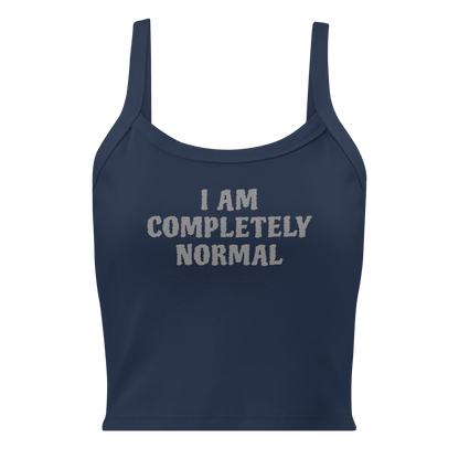 "I am completely normal" printed on a solid navy blend women's micro-rib tanktop laying on a flat surface