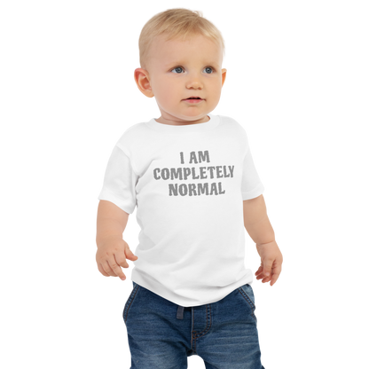 "I am completely normal" printed on a white baby jersey short sleeve tee worn by a male