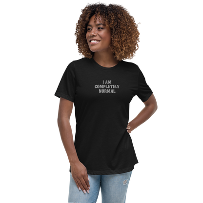 "I am completely normal" printed on a black women's relaxed t-shirt worn by a female