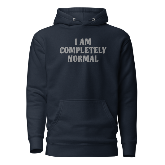 "I am completely normal" printed on a navy blazer on an invisible / simulated body