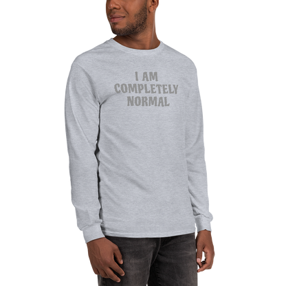"I am completely normal" printed on a sport grey men's long sleeve shirt worn by a male