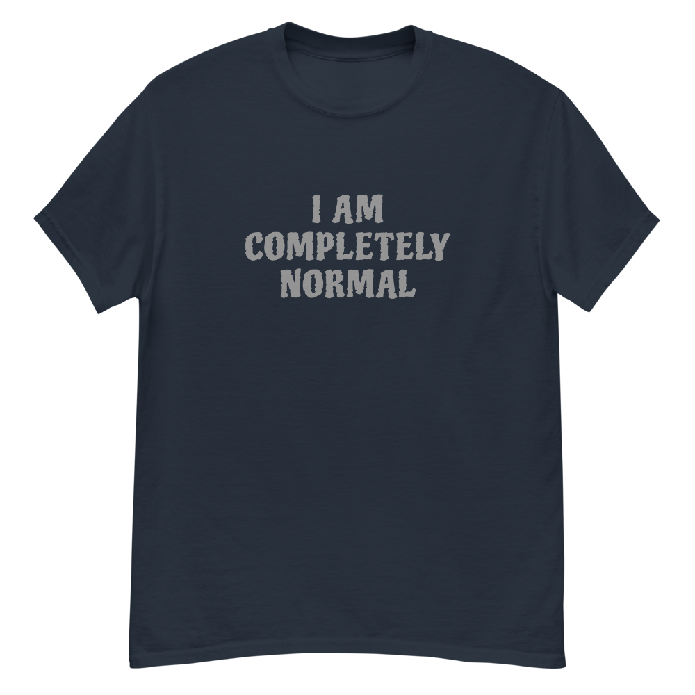 "I am completely normal" printed on a navy unisex classic tee laying on a flat surface