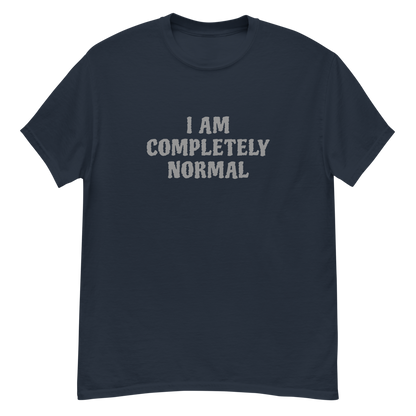 "I am completely normal" printed on a navy unisex classic tee laying on a flat surface