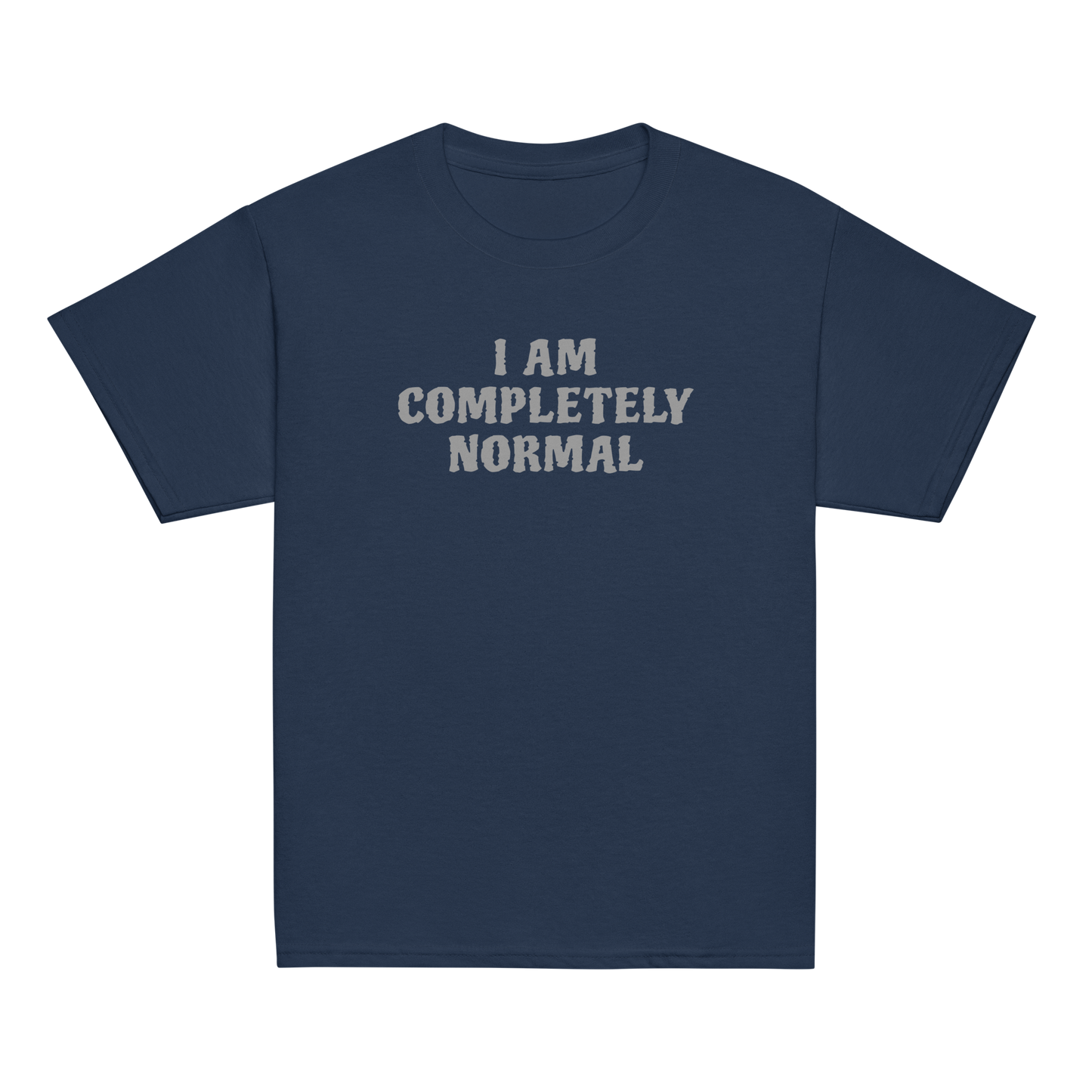 "I am completely normal" printed on a navy youth classic tee laying on a flat surface