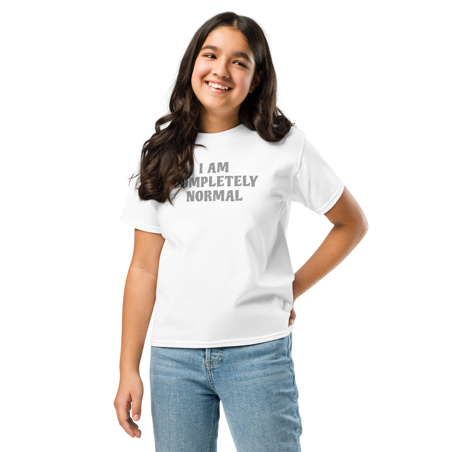 "I am completely normal" printed on a white youth classic tee worn by a female