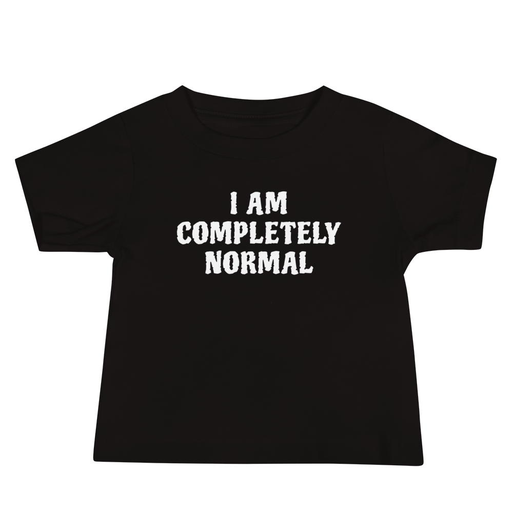 "I am completely normal" printed on a black baby jersey short sleeve tee laying on a flat surface
