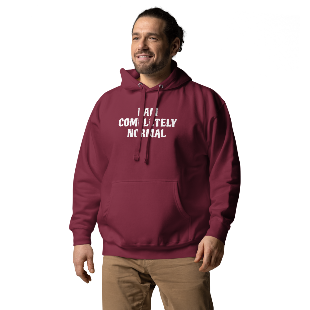 "I am completely normal" printed on a maroon unisex hoodie worn by a male