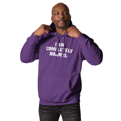 "I am completely normal" printed on a purple unisex hoodie worn by a male