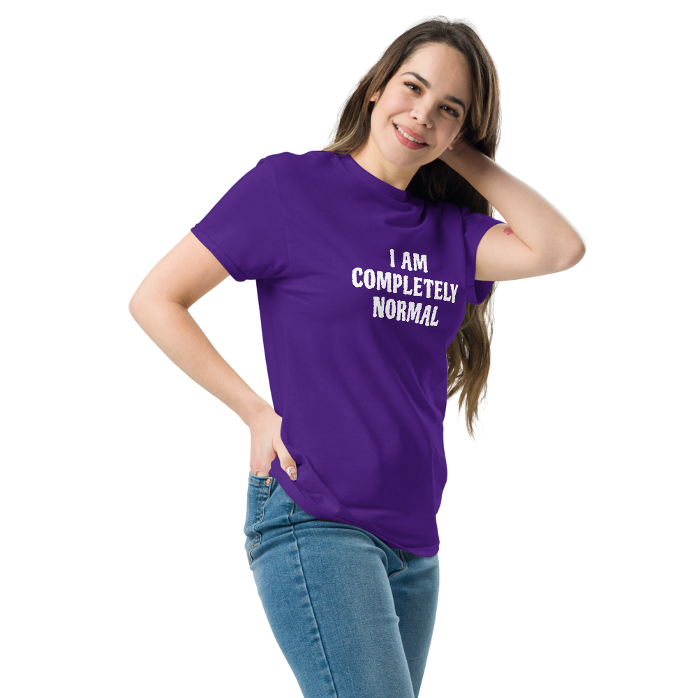 "I am completely normal" printed on a purple unisex classic tee worn by a female