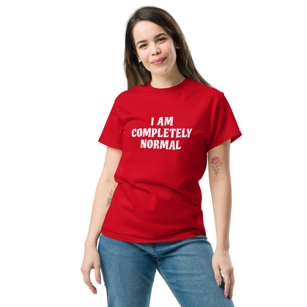 "I am completely normal" printed on a red unisex classic tee worn by a female