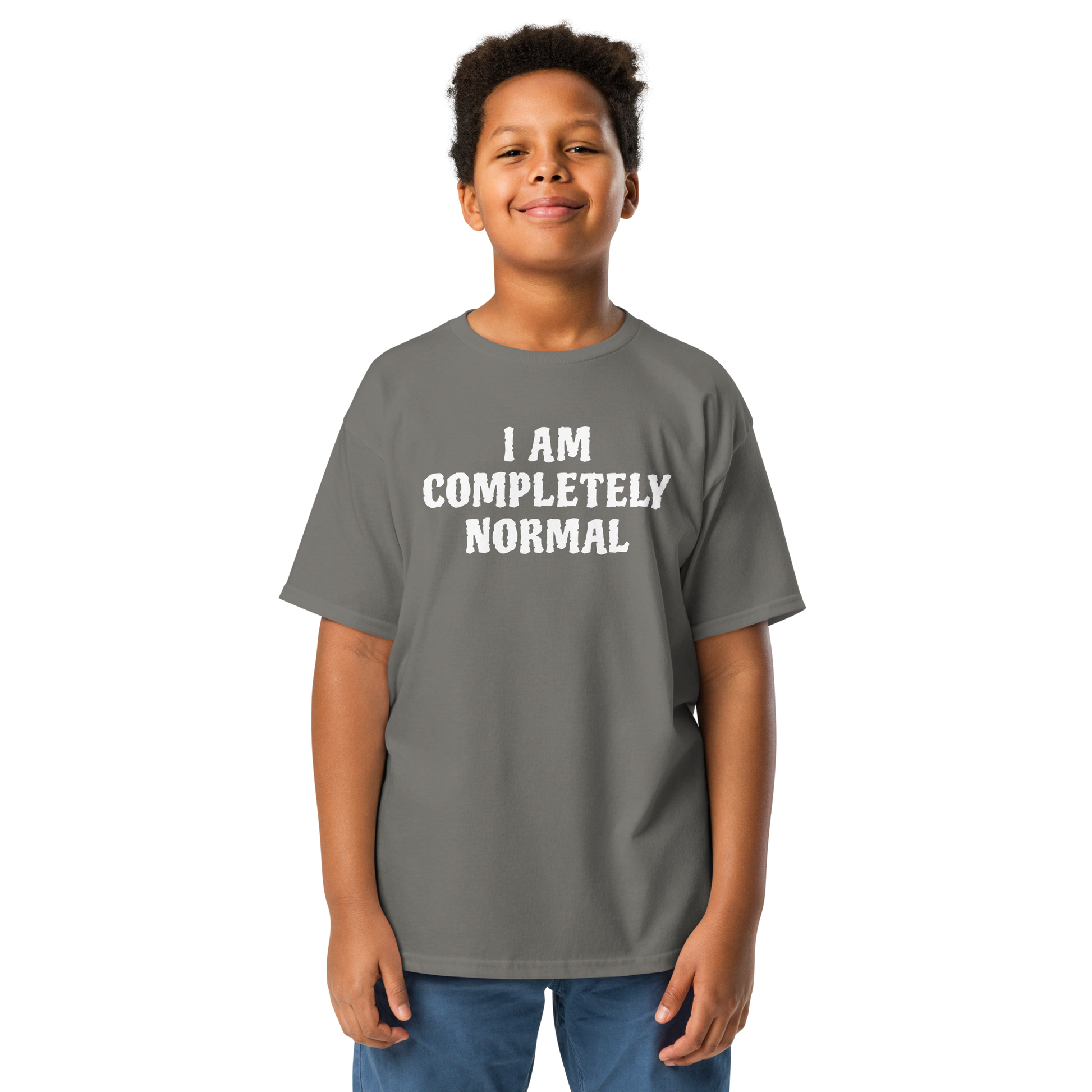 "I am completely normal" printed on a charcoal youth classic tee worn by a male