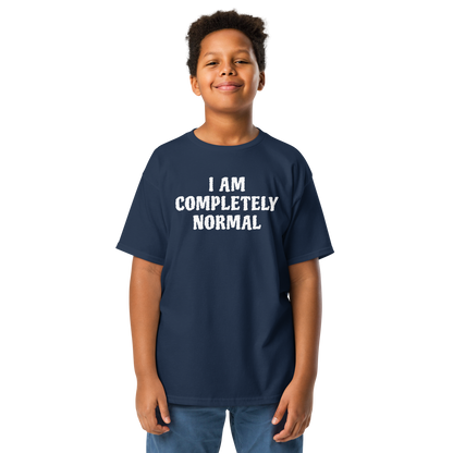 "I am completely normal" printed on a navy youth classic tee worn by a male