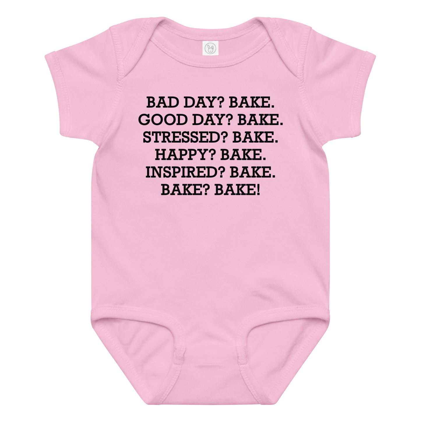 "Bad Day? Bake. Good Day? Bake. Stressed? Bake. Happy? Bake. Inspired? Bake. Bake? Bake!" printed on a pink baby jersey bodysuit laying on a flat surface amongst other clothes