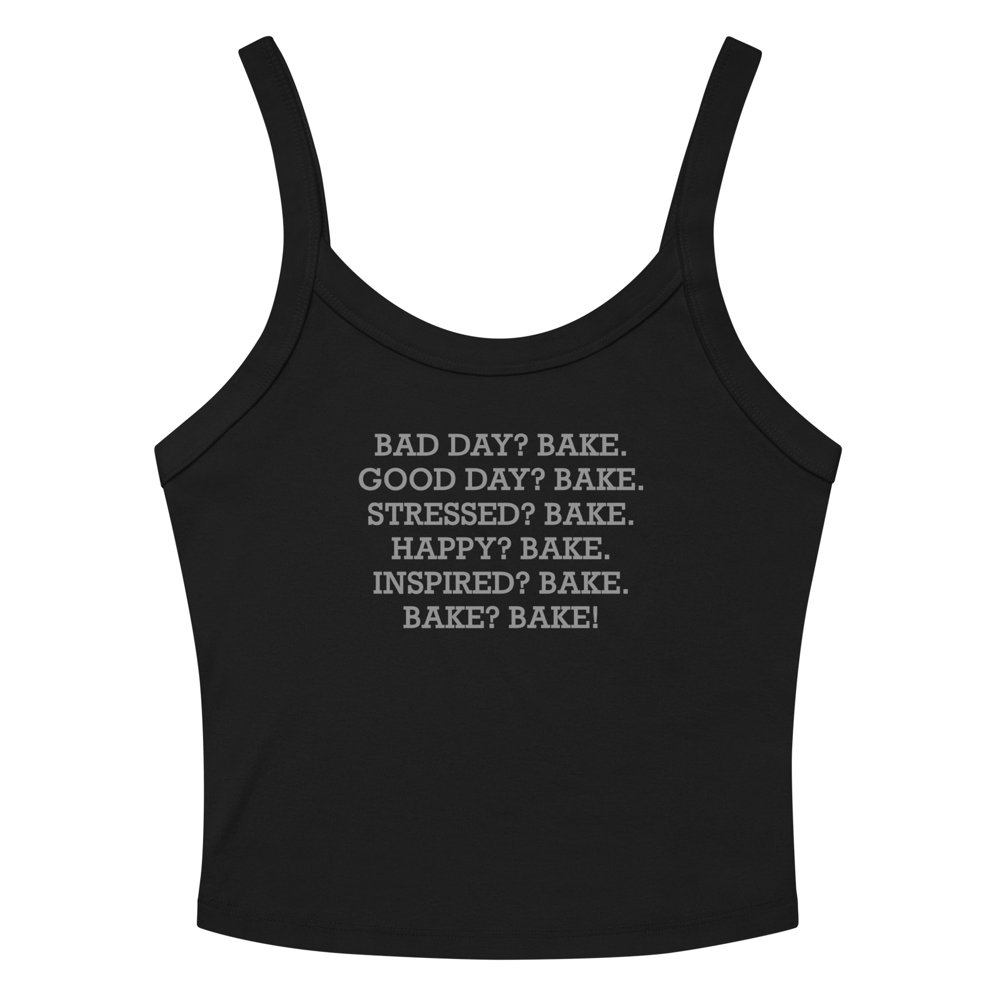 "Bad Day? Bake. Good Day? Bake. Stressed? Bake. Happy? Bake. Inspired? Bake. Bake? Bake!" printed on a solid black blend women's micro-rib tanktop laying on a flat surface amongst sunglasses and shorts