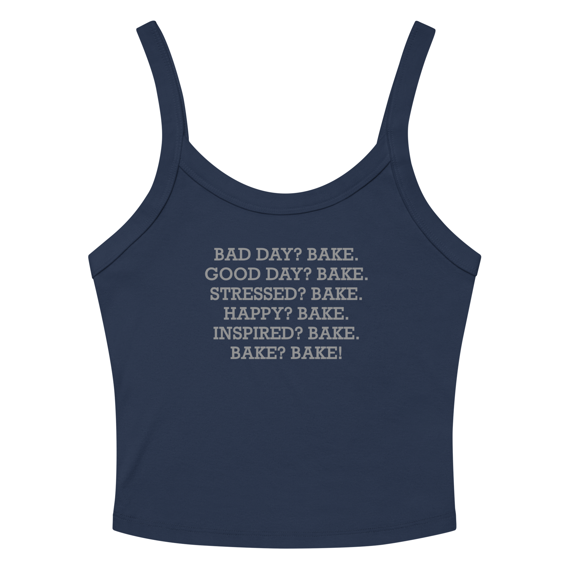 "Bad Day? Bake. Good Day? Bake. Stressed? Bake. Happy? Bake. Inspired? Bake. Bake? Bake!" printed on a solid navy blend women's micro-rib tanktop laying on a flat surface amongst sunglasses and shorts