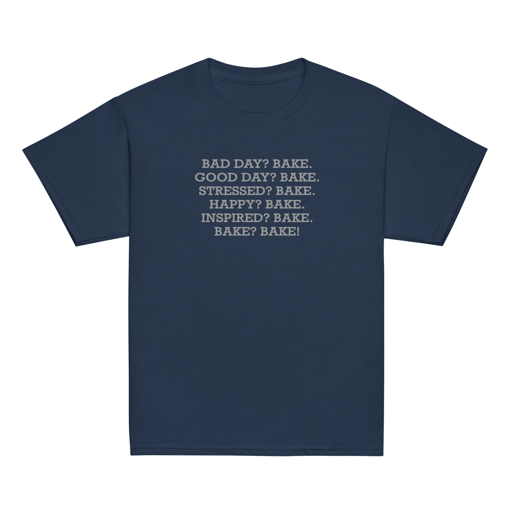 "Bad Day? Bake. Good Day? Bake. Stressed? Bake. Happy? Bake. Inspired? Bake. Bake? Bake!" printed on a navy youth classic tee laying on a flat surface