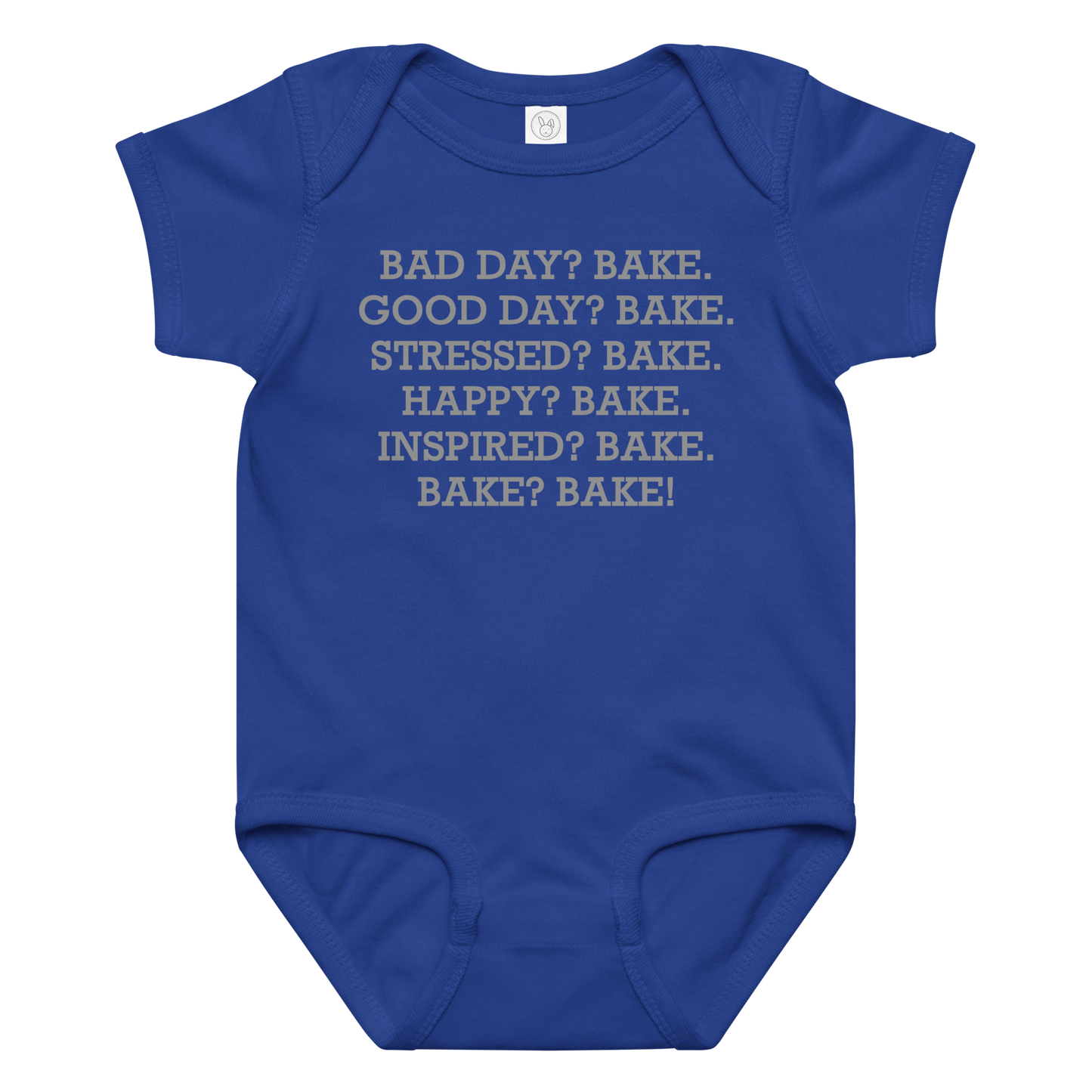 "Bad Day? Bake. Good Day? Bake. Stressed? Bake. Happy? Bake. Inspired? Bake. Bake? Bake!" printed on a royal baby jersey bodysuit laying on a flat surface amongst other clothes