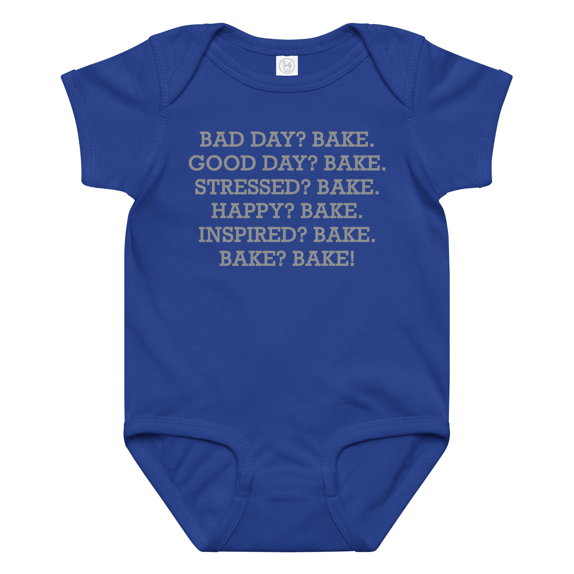 "Bad Day? Bake. Good Day? Bake. Stressed? Bake. Happy? Bake. Inspired? Bake. Bake? Bake!" printed on a royal baby jersey bodysuit laying on a flat surface amongst other clothes