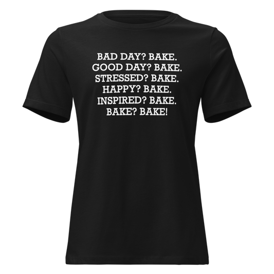"Bad Day? Bake. Good Day? Bake. Stressed? Bake. Happy? Bake. Inspired? Bake. Bake? Bake!" printed on a black on an invisible / simulated body