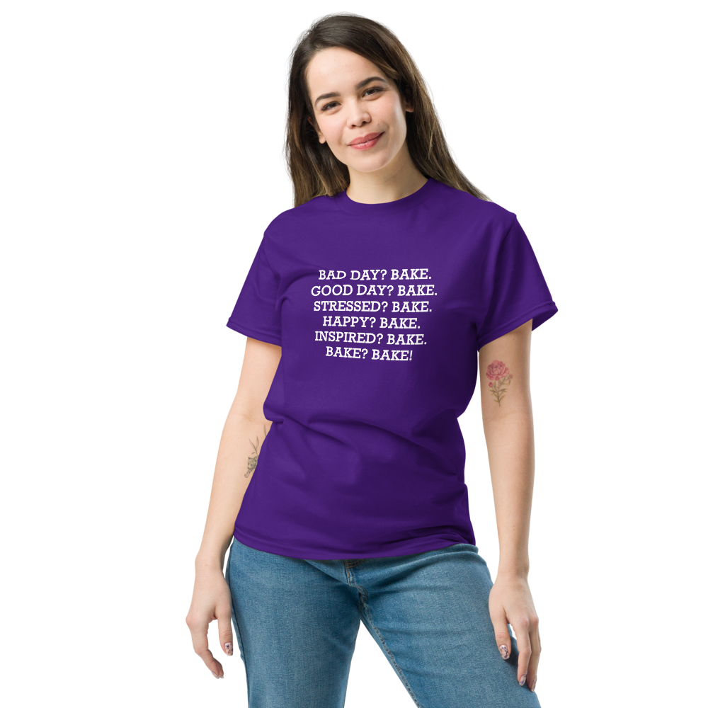 "Bad Day? Bake. Good Day? Bake. Stressed? Bake. Happy? Bake. Inspired? Bake. Bake? Bake!" printed on a purple unisex classic tee worn by a female