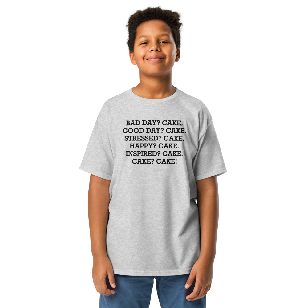 "Bad Day? Cake. Good Day? Cake. Stressed? Cake. Happy? Cake. Inspired? Cake. Cake? Cake!" printed on a sport grey youth classic tee worn by a male