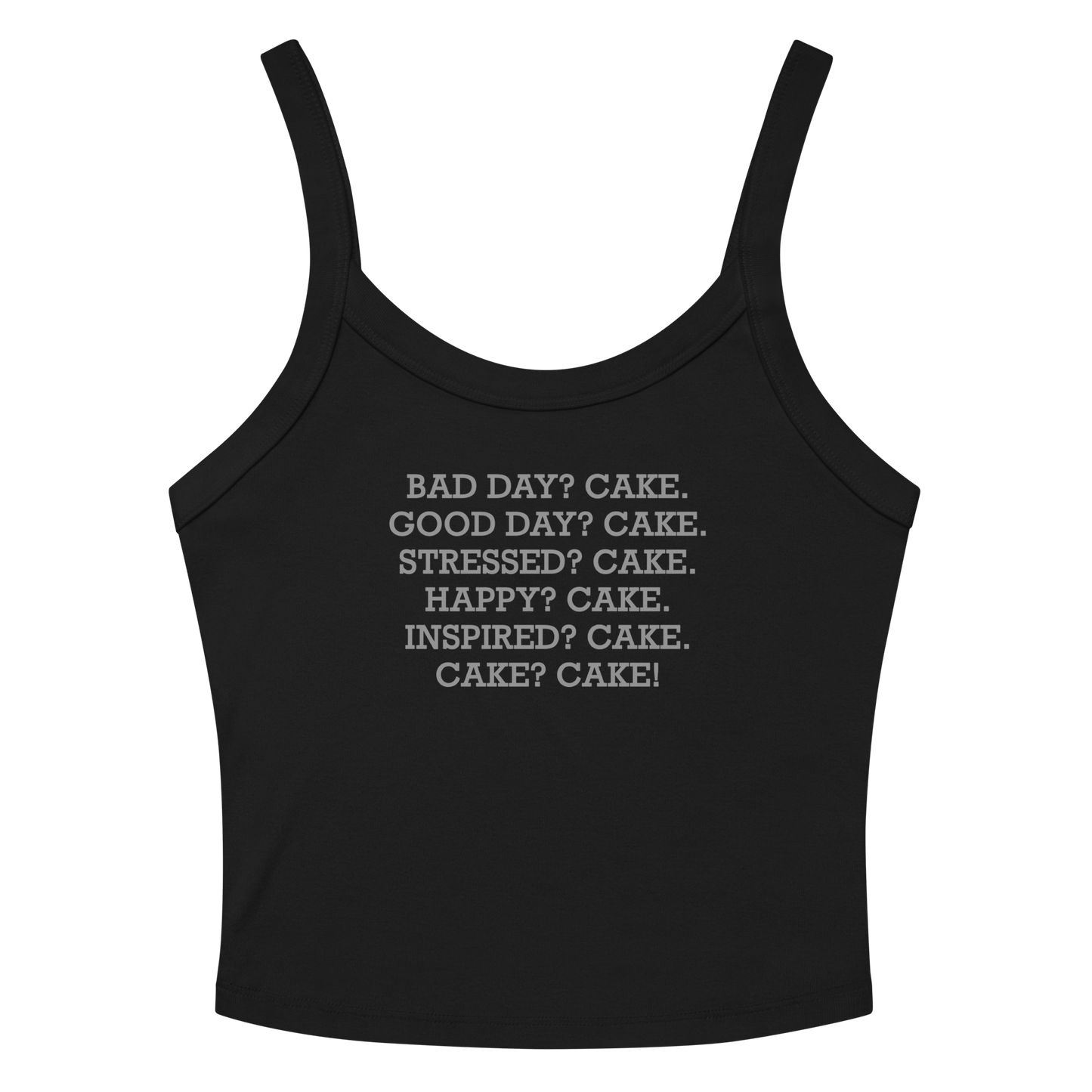 "Bad Day? Cake. Good Day? Cake. Stressed? Cake. Happy? Cake. Inspired? Cake. Cake? Cake!" printed on a solid black blend women's micro-rib tanktop laying on a flat surface amongst sunglasses and shorts