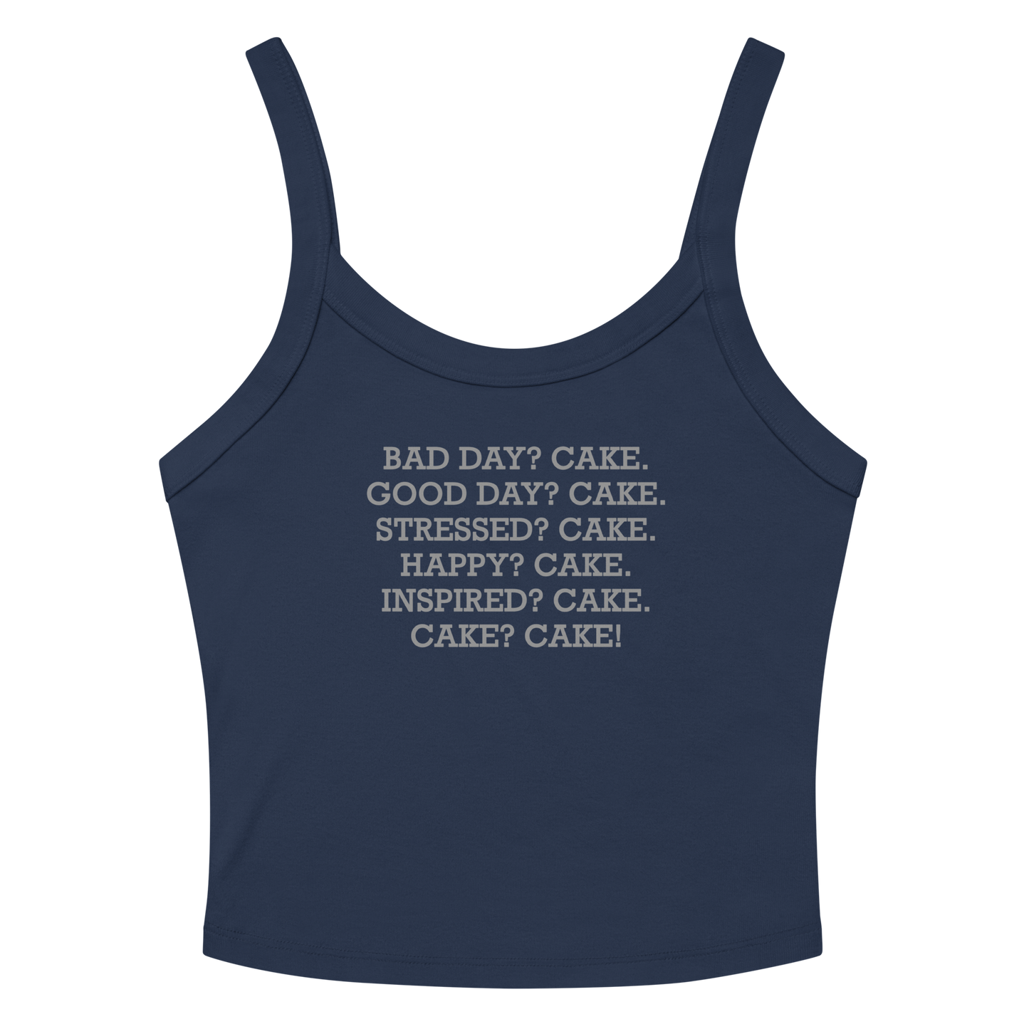 "Bad Day? Cake. Good Day? Cake. Stressed? Cake. Happy? Cake. Inspired? Cake. Cake? Cake!" printed on a solid navy blend women's micro-rib tanktop laying on a flat surface amongst sunglasses and shorts
