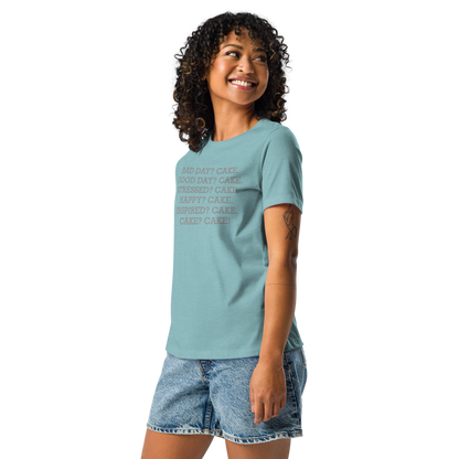 "Bad Day? Cake. Good Day? Cake. Stressed? Cake. Happy? Cake. Inspired? Cake. Cake? Cake!" printed on a heather blue lagoon women's relaxed t-shirt worn by a female