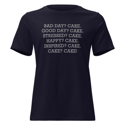 "Bad Day? Cake. Good Day? Cake. Stressed? Cake. Happy? Cake. Inspired? Cake. Cake? Cake!" printed on a navy on an invisible / simulated body