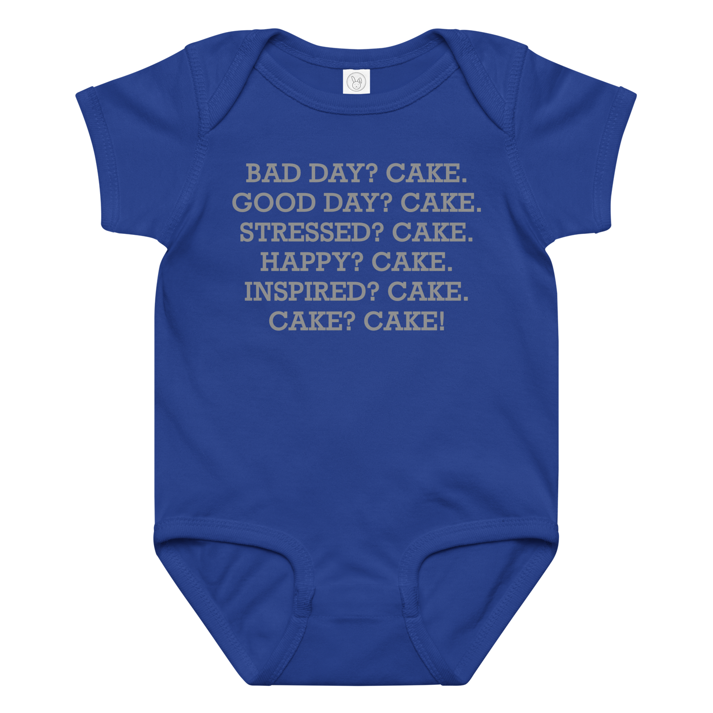 "Bad Day? Cake. Good Day? Cake. Stressed? Cake. Happy? Cake. Inspired? Cake. Cake? Cake!" printed on a royal baby jersey bodysuit laying on a flat surface amongst other clothes