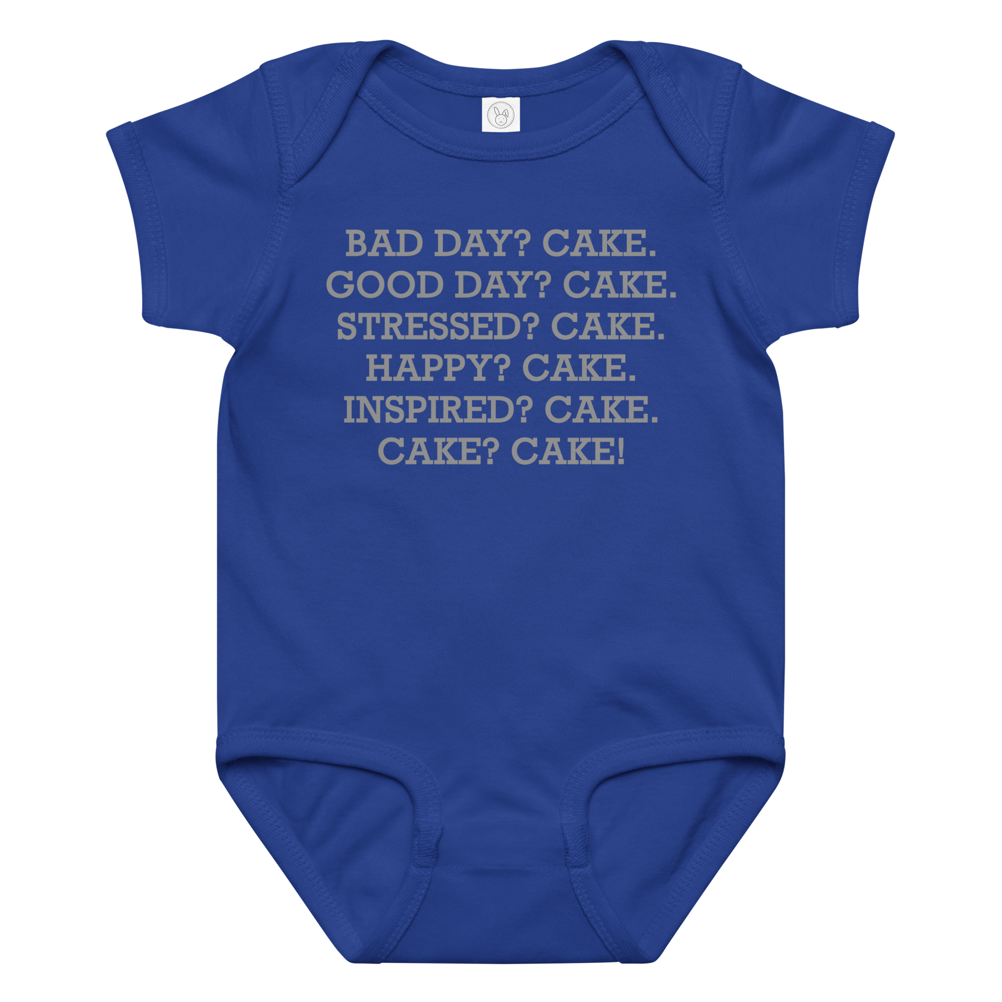 "Bad Day? Cake. Good Day? Cake. Stressed? Cake. Happy? Cake. Inspired? Cake. Cake? Cake!" printed on a royal baby jersey bodysuit laying on a flat surface amongst other clothes