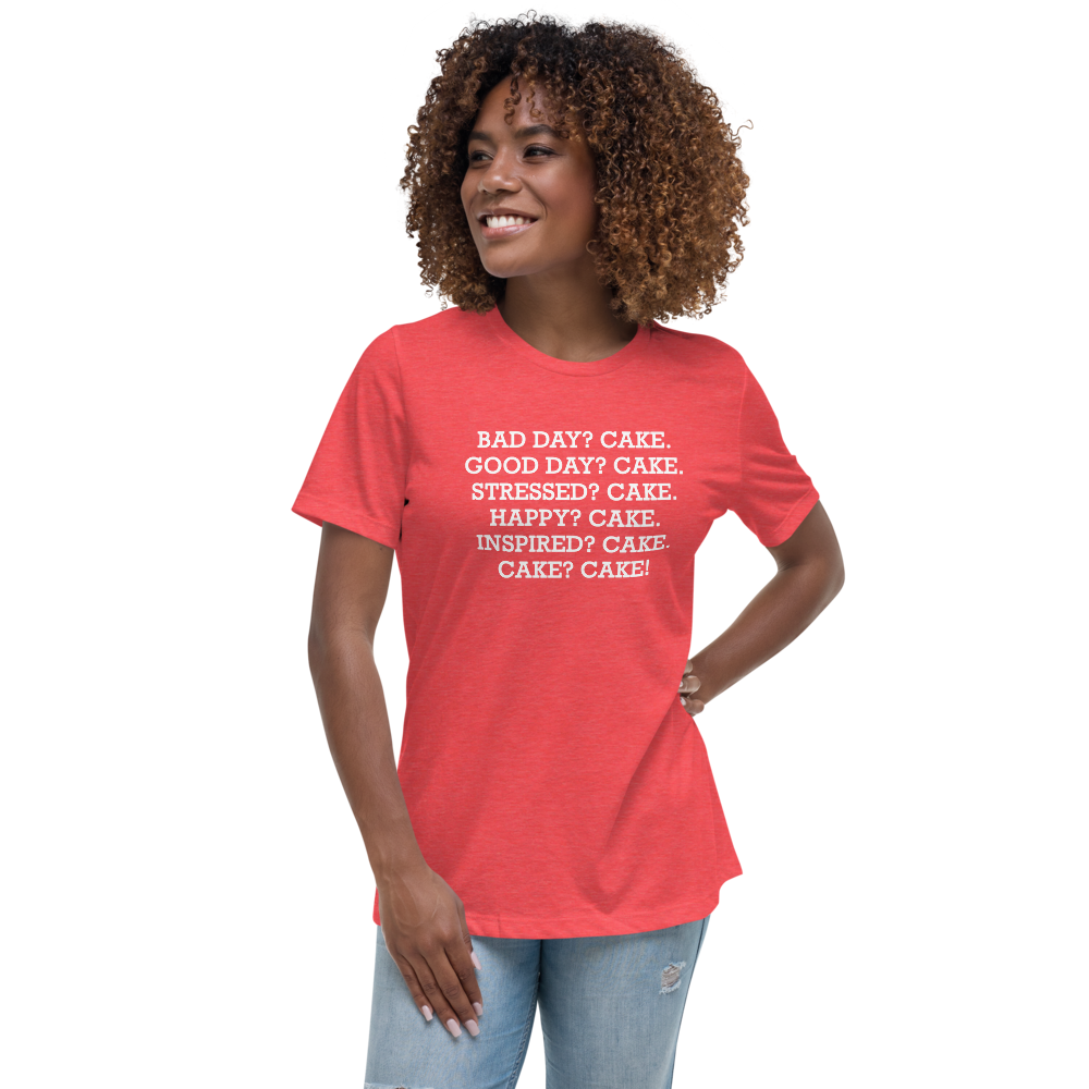 "Bad Day? Cake. Good Day? Cake. Stressed? Cake. Happy? Cake. Inspired? Cake. Cake? Cake!" printed on a heather red women's relaxed t-shirt worn by a female