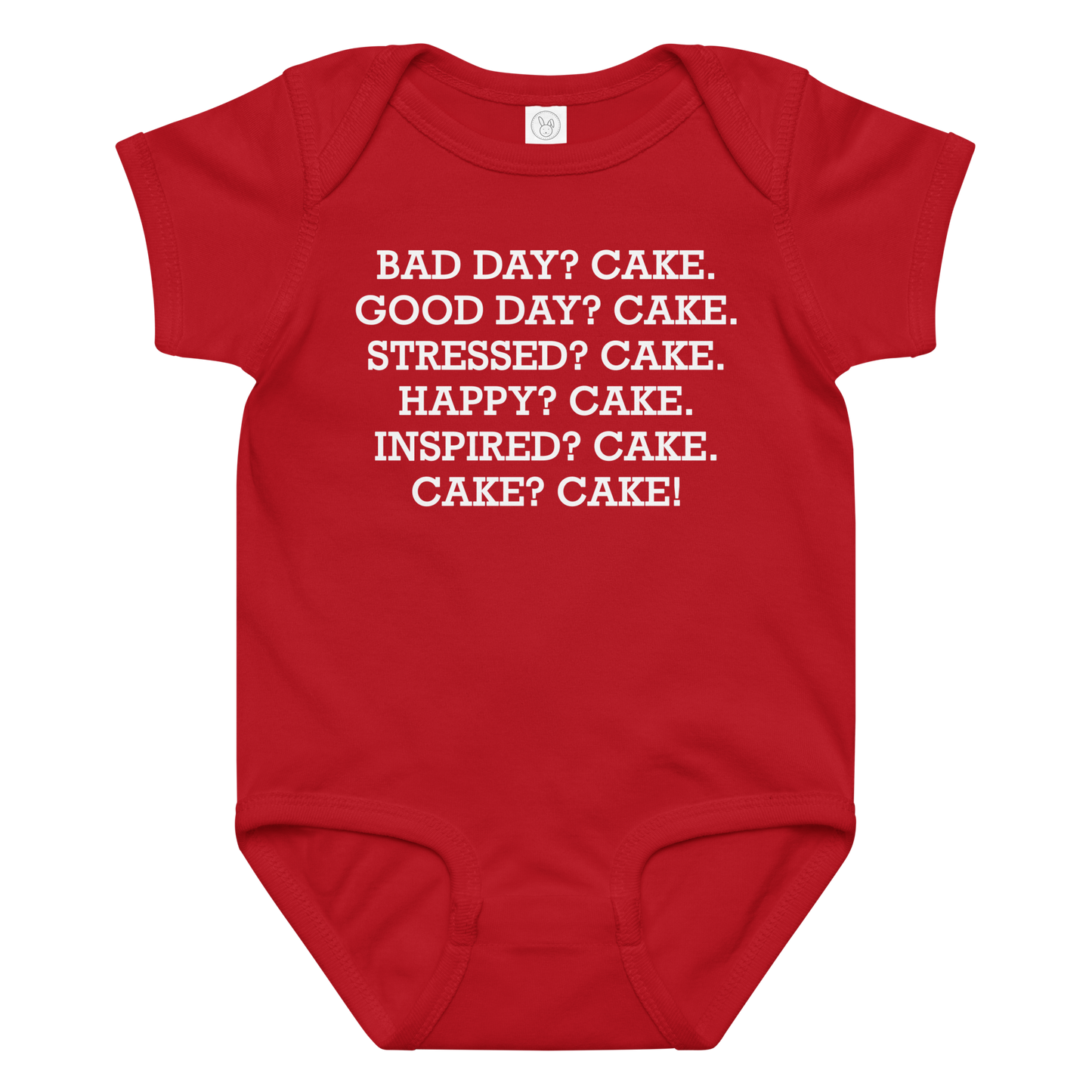 "Bad Day? Cake. Good Day? Cake. Stressed? Cake. Happy? Cake. Inspired? Cake. Cake? Cake!" printed on a red baby jersey bodysuit laying on a flat surface amongst other clothes