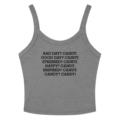"Bad Day? Candy. Good Day? Candy. Stressed? Candy. Happy? Candy. Inspired? Candy. Candy? Candy!" printed on a athletic heather women's micro-rib tanktop laying on a flat surface amongst sunglasses and shorts