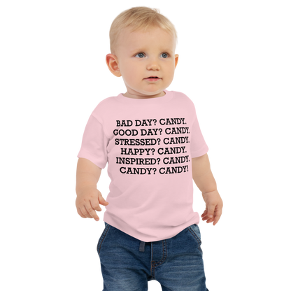 "Bad Day? Candy. Good Day? Candy. Stressed? Candy. Happy? Candy. Inspired? Candy. Candy? Candy!" printed on a pink baby jersey short sleeve tee worn by a male