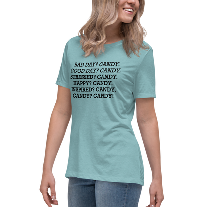 "Bad Day? Candy. Good Day? Candy. Stressed? Candy. Happy? Candy. Inspired? Candy. Candy? Candy!" printed on a heather blue lagoon women's relaxed t-shirt worn by a female