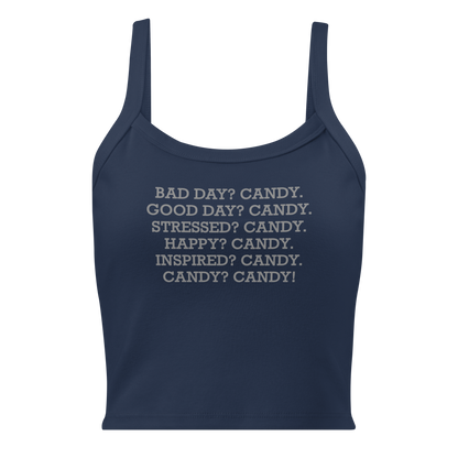 "Bad Day? Candy. Good Day? Candy. Stressed? Candy. Happy? Candy. Inspired? Candy. Candy? Candy!" printed on a solid navy blend women's micro-rib tanktop laying on a flat surface
