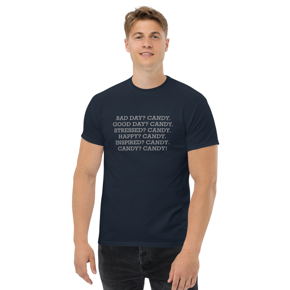 "Bad Day? Candy. Good Day? Candy. Stressed? Candy. Happy? Candy. Inspired? Candy. Candy? Candy!" printed on a navy unisex classic tee worn by a male
