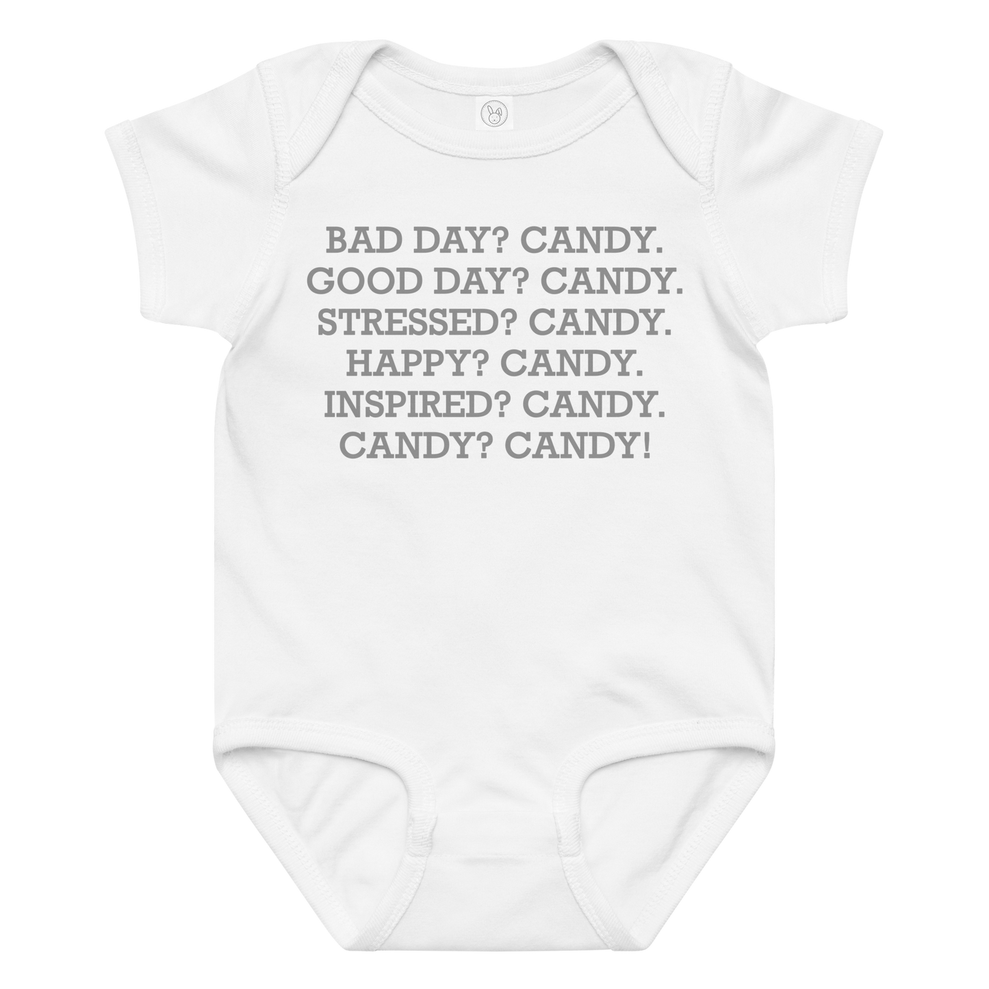 "Bad Day? Candy. Good Day? Candy. Stressed? Candy. Happy? Candy. Inspired? Candy. Candy? Candy!" printed on a white baby jersey bodysuit laying on a flat surface amongst other clothes