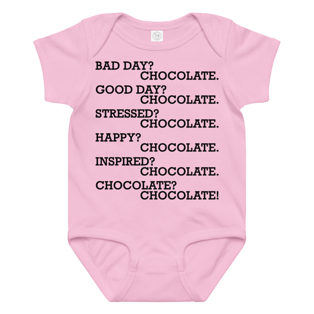 "Bad Day? Chocolate. Good Day? Chocolate. Stressed? Chocolate. Happy? Chocolate. Inspired? Chocolate. Chocolate? Chocolate!" printed on a pink baby jersey bodysuit laying on a flat surface amongst other clothes