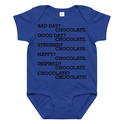 "Bad Day? Chocolate. Good Day? Chocolate. Stressed? Chocolate. Happy? Chocolate. Inspired? Chocolate. Chocolate? Chocolate!" printed on a royal baby jersey bodysuit laying on a flat surface amongst other clothes