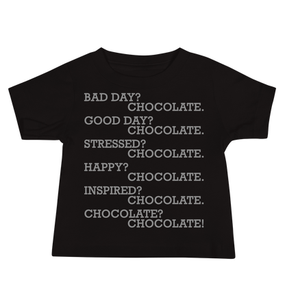 "Bad Day? Chocolate. Good Day? Chocolate. Stressed? Chocolate. Happy? Chocolate. Inspired? Chocolate. Chocolate? Chocolate!" printed on a black baby jersey short sleeve tee laying on a flat surface