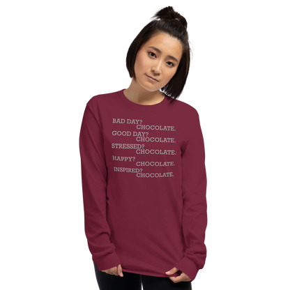 "Bad Day? Chocolate. Good Day? Chocolate. Stressed? Chocolate. Happy? Chocolate. Inspired? Chocolate. Chocolate? Chocolate!" printed on a maroon men's long sleeve shirt worn by a female