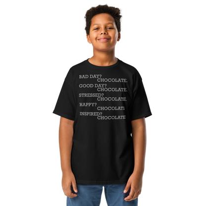 "Bad Day? Chocolate. Good Day? Chocolate. Stressed? Chocolate. Happy? Chocolate. Inspired? Chocolate. Chocolate? Chocolate!" printed on a black youth classic tee worn by a male